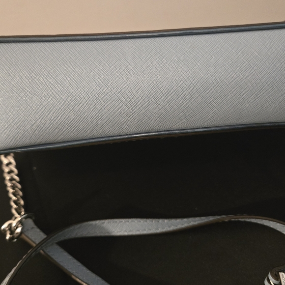The Michael Kors Jet Set Travel Crossbody Bag in light blue - Picture 10 of 12